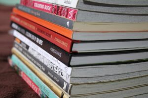 coloring books, book stack, coloring, collection, gray book, gray books